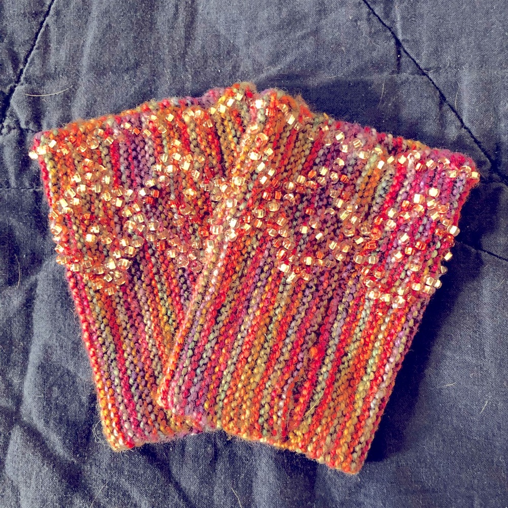 Hand knit and beaded wrist warmers.